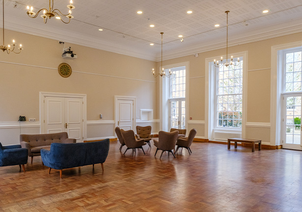 interior view of a staircase under construction with safety barriers and materials visible showing progress on 9 renovations